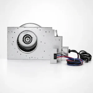 Industrial blower motor unit with a circular fan opening in a metal housing and bundled wires on the right.